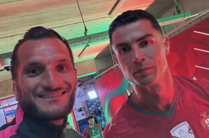 Super Eagles Strength and Conditioning Coach Thomas Gornouec wasted no time in taking the opportunity to get selfies with Cristiano Ronaldo - Photo Credit : Softfootball Media