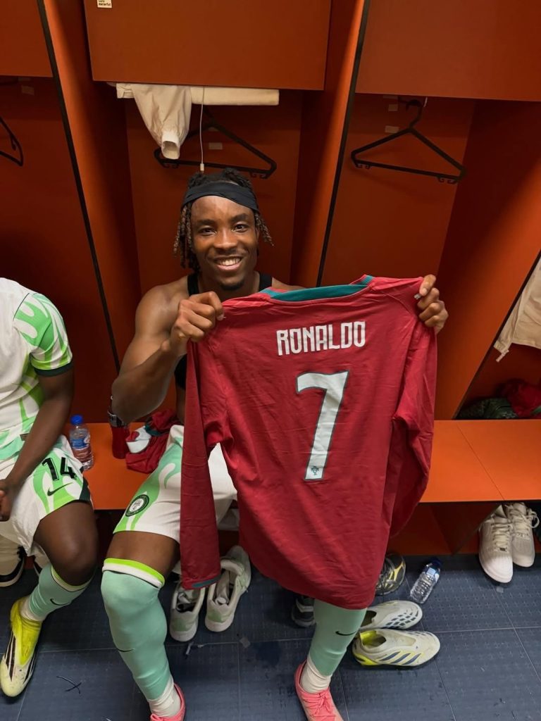 Super Eagles and Olympiacos defender Bruno Onyemaechi got his hands on Cristiano Ronaldo's jersey after Portugal's 2-1 victory over Nigeria. - Photo Credit : Softfootball Media