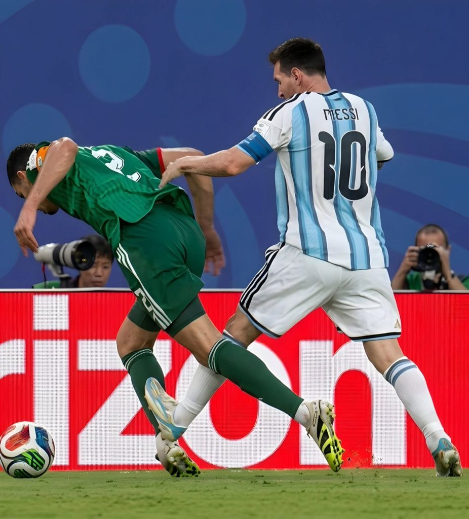 Messi tackle against Algeria player (Photo credit: X media)