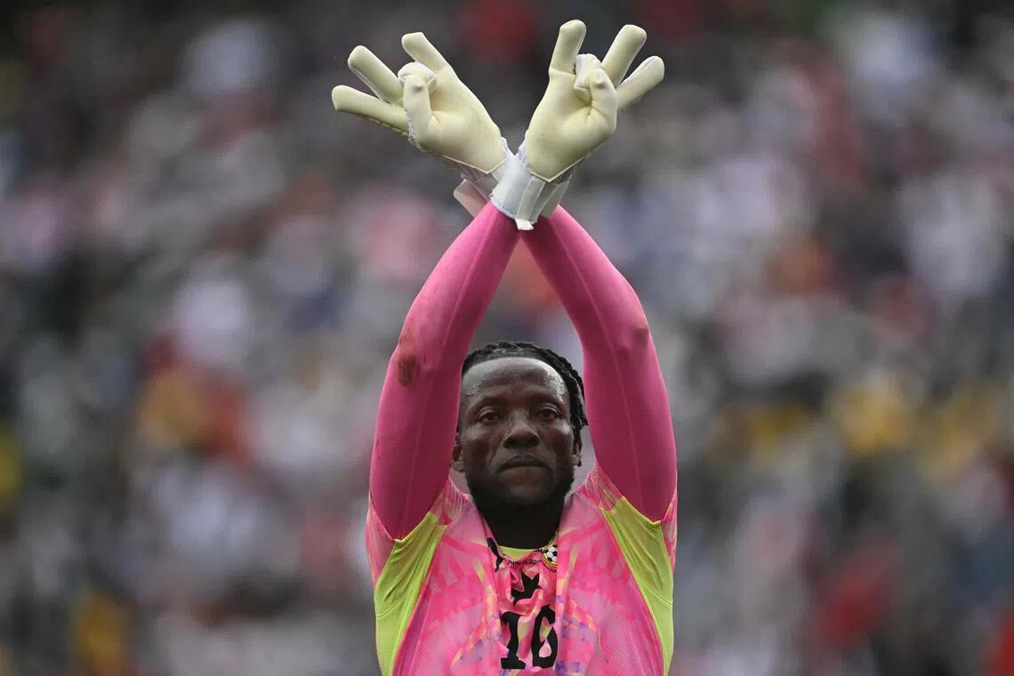 Ghana's goalkeeper Benjamin Asare celebrating the 0-0 draw with England at the Boston Stadium in Foxborough on June 23. PHOTO: AFP