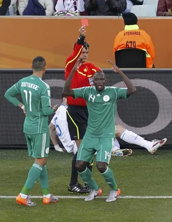 Sani Kaita was sent off in the 33rd minute for kicking out at Vasilis Torosidis - Photo Credit : Rediff