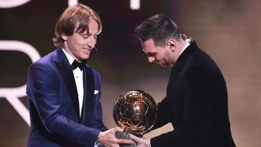 modric and messi. (photo credit: yahoo sport)
