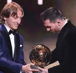 modric and messi. (photo credit: yahoo sport)