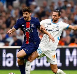 Olympique de Marseille's Adrien Rabiot in action with Paris St Germain's Lucas Beraldo - Photo Credit : REUTERS